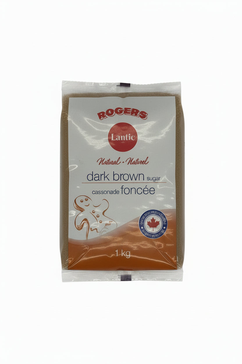 A 1 kg package of Rogers Lantic dark brown sugar, showing the brown sugar visible through the clear plastic wrapping against a white background.