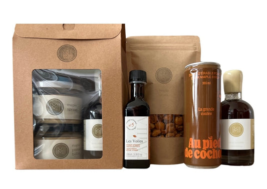a discovery sets with respectively 2 jars on the left and one bottle of maple syrup presented in a brown carboard bag with ME, MAPLE & I logo and a window showing the products plus additional maple products next to it a discovery sets with respectively 2 jars on the left and one bottle of maple syrup presented in a brown carboard bag with ME, MAPLE & I logo and a window showing the products plus additional maple products next to it