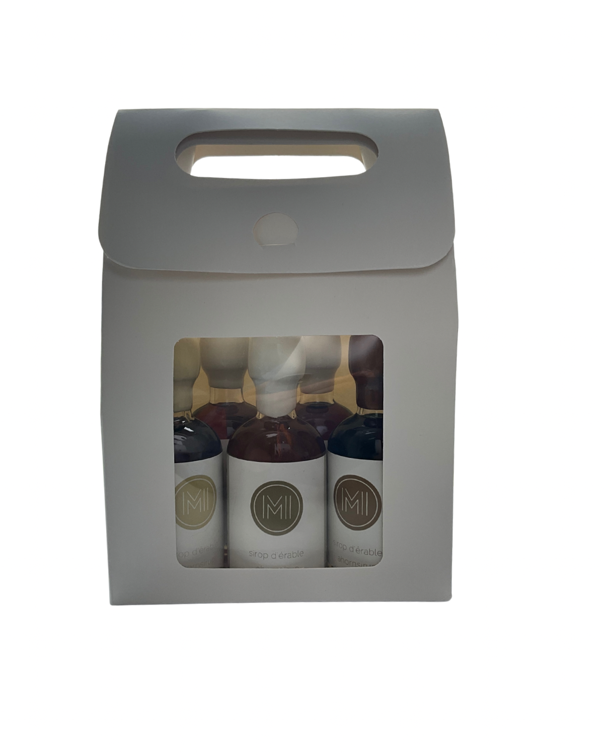 a discovery sets with 5 bottles of maple syrup presented in a white standup bagand a window showing the products