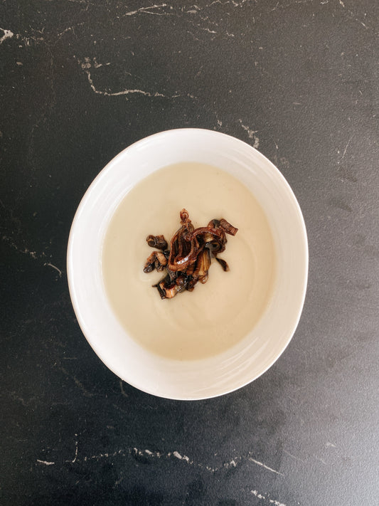 caramelized leeks with maple syrup garnish and soup