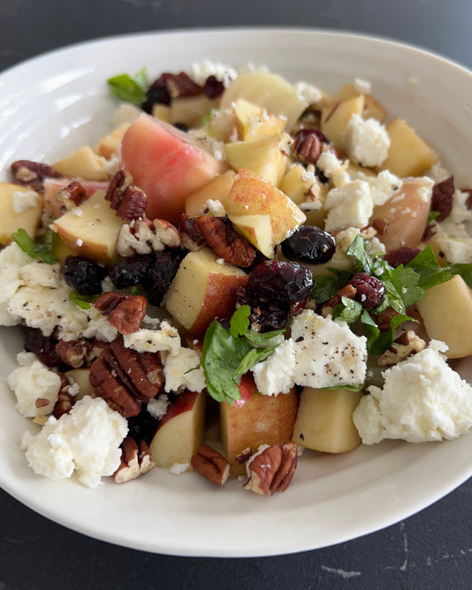 beets, apple, dried cranberries, pecan, parsley and feta with a maple syrup dressing