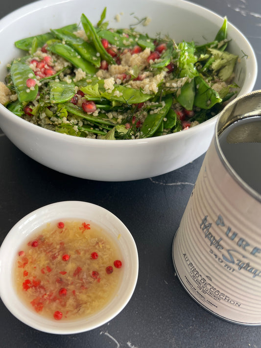 sugar snap peas and pomegranate salad with its maple and lemon dressing