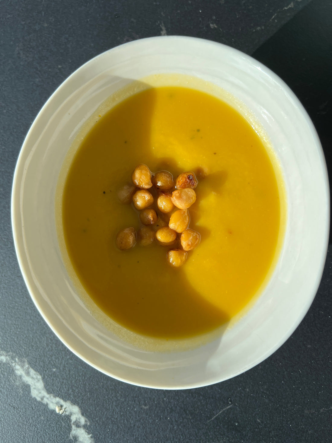 celeriac and sweet potatoes soup and its maple chickpeas garnish