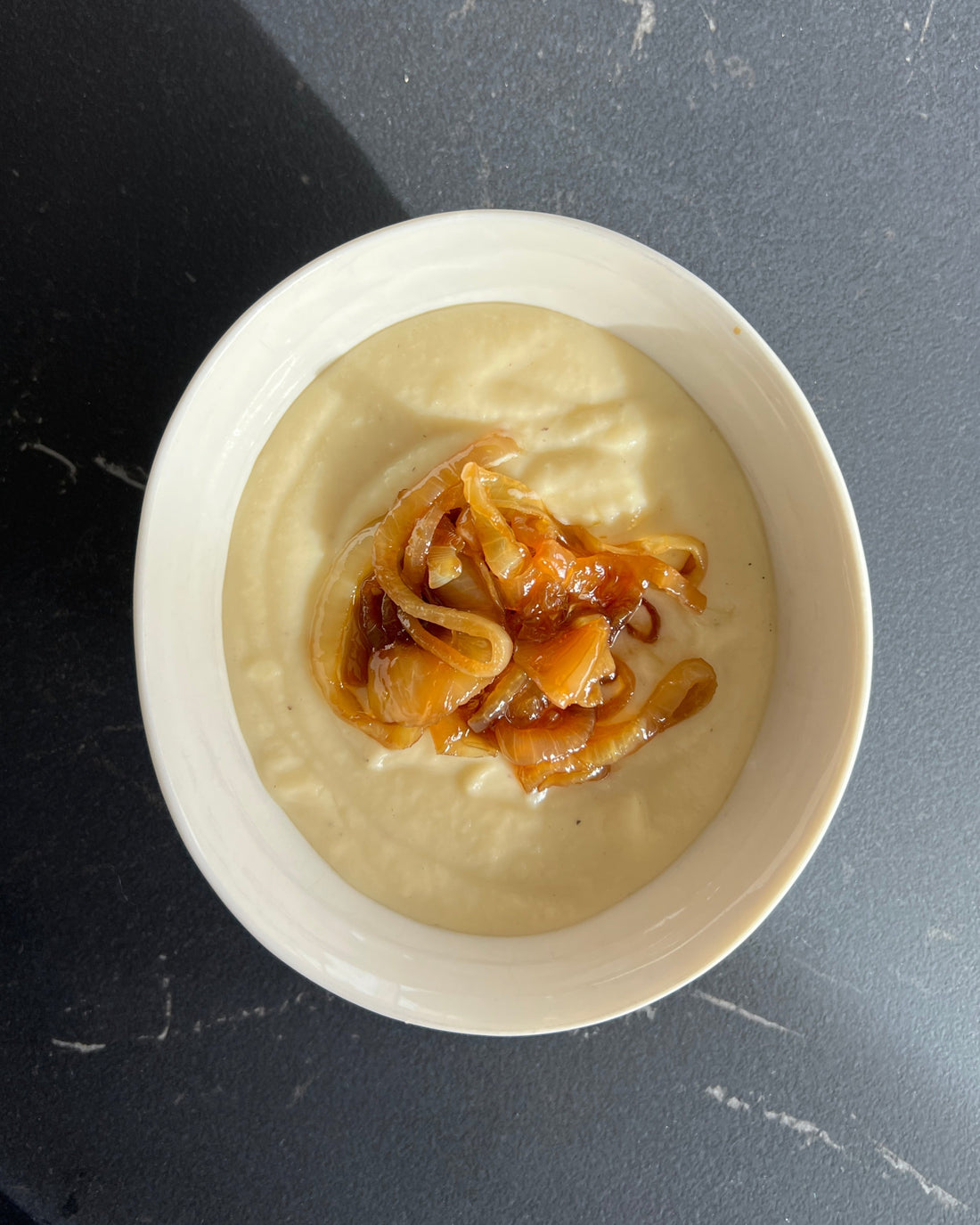 parsnip soup and maple caramelized onions garnish