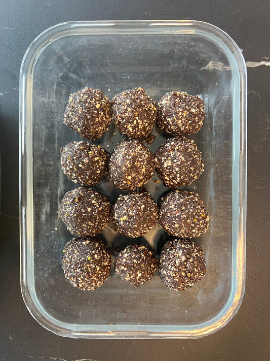 maple energy balls with nuts, apricot and cacao