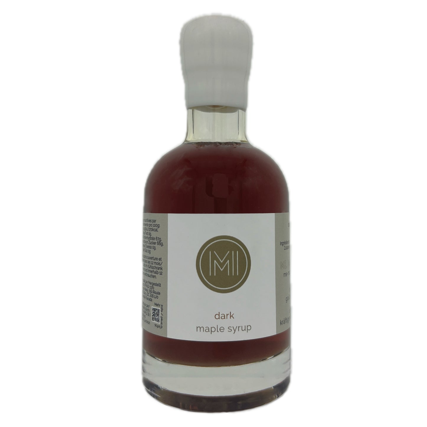 A bottle of dark maple syrup with a white cap and a white label featuring a gold circular logo with the letters 'M' and 'I'.