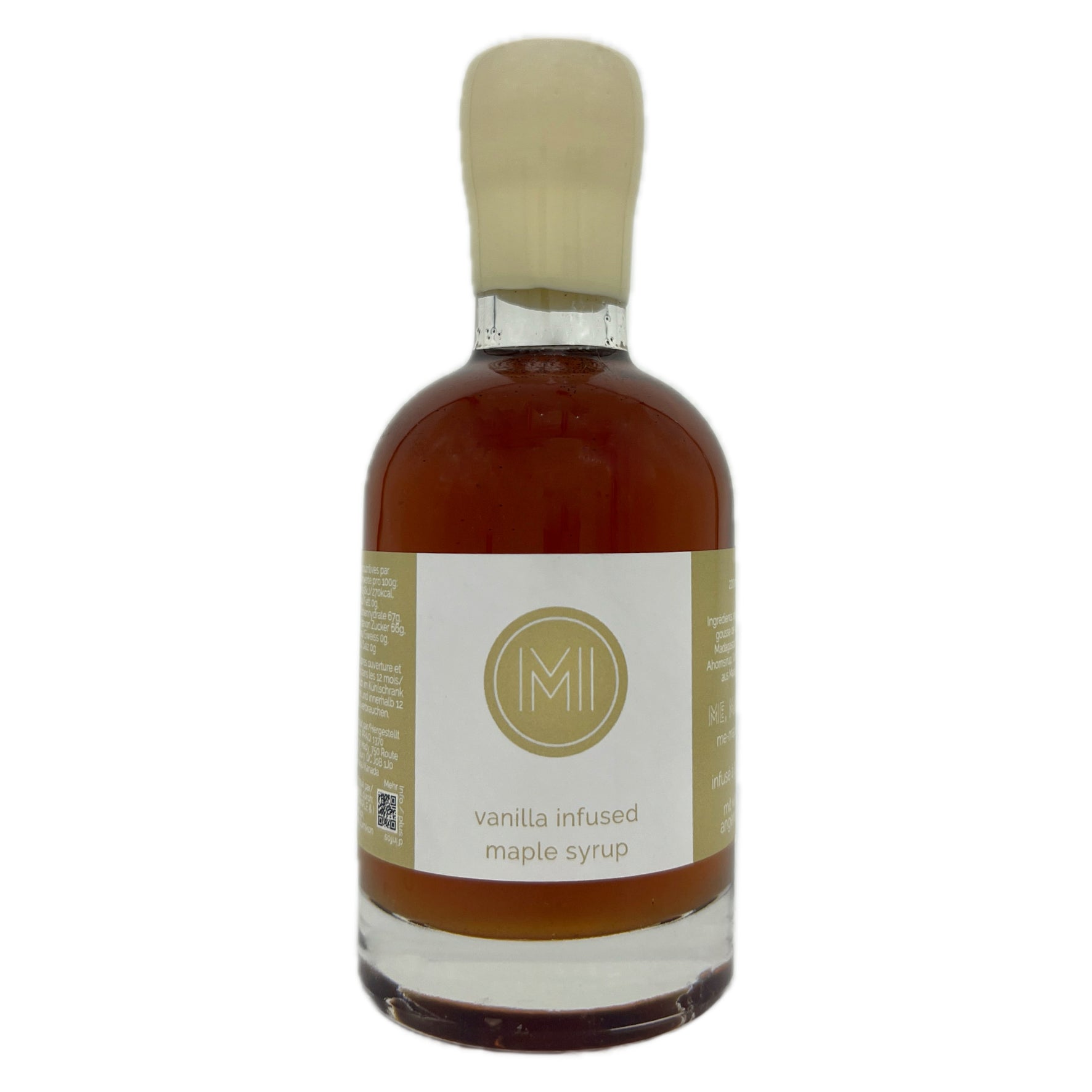 A bottle of vanilla infused maple syrup with amber liquid inside, a white label with a beige logo, and a beige cap, shown on a plain white background.