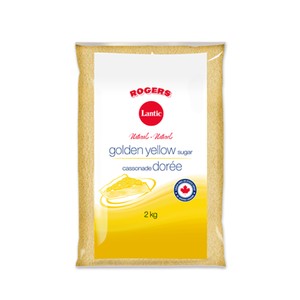 bag of golden yellow sugar on a white background