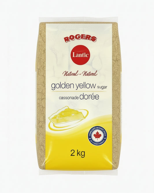 A 2 kg bag of Rogers Lantic Golden Yellow Sugar, showing the brown sugar through a clear plastic bag with a white and yellow label.