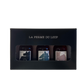 Three small bottles in a black box with 'La Ferme du Loup' branding on a white background.