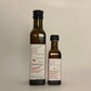 2 side by side bottles of different sizes of maple vinegars no.6 named Rasemotte