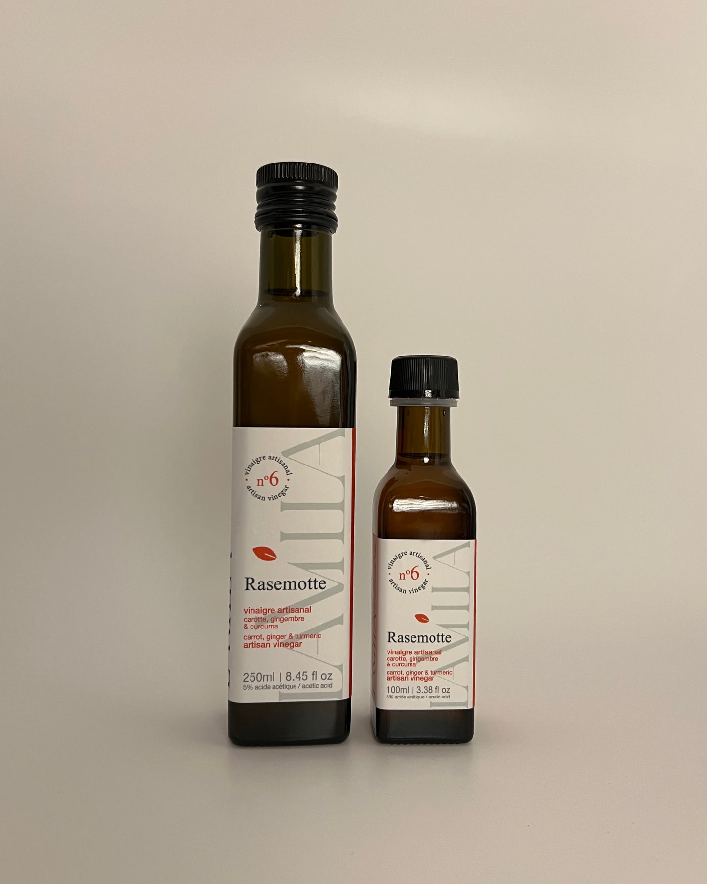 2 side by side bottles of different sizes of maple vinegars no.6 named Rasemotte