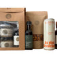 a discovery sets with respectively 2 jars on the left and one bottle of maple syrup presented in a brown carboard bag with ME, MAPLE & I logo and a window showing the products, a 100ml maple vinegar, a maple corn snack, a 355ml amber maple syrup and a 200ml coffee maple syrup